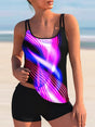 Women's plus size abstract printed tankini swimsuit with double spaghetti straps and black swim shorts