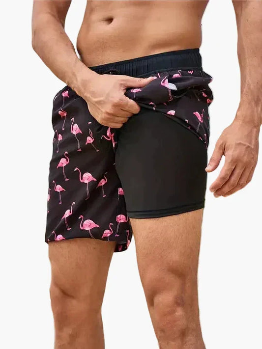 Men's tropical print swim shorts with drawstring waist and inner compression shorts
