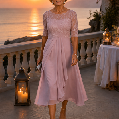 Women's floral lace bodice midi dress with three quarter sleeves and pleated ruffle skirt