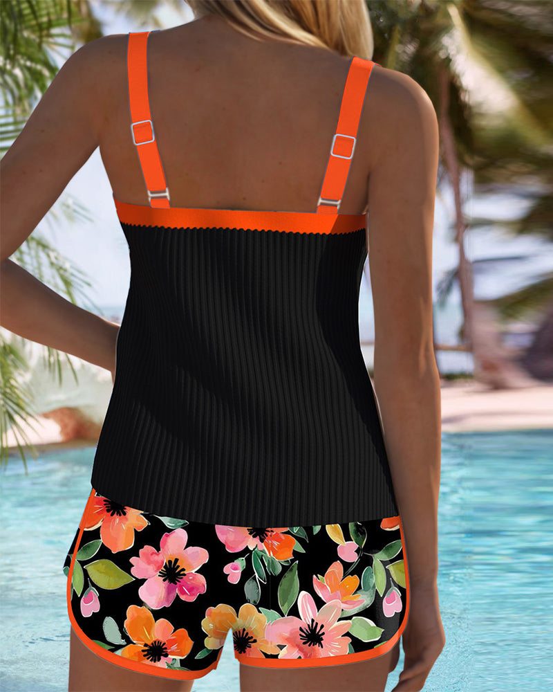 Women's floral tankini set with sleeveless ribbed top and swim shorts