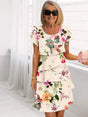 Women's patterned short sleeve dress with round neckline and tiered skirt