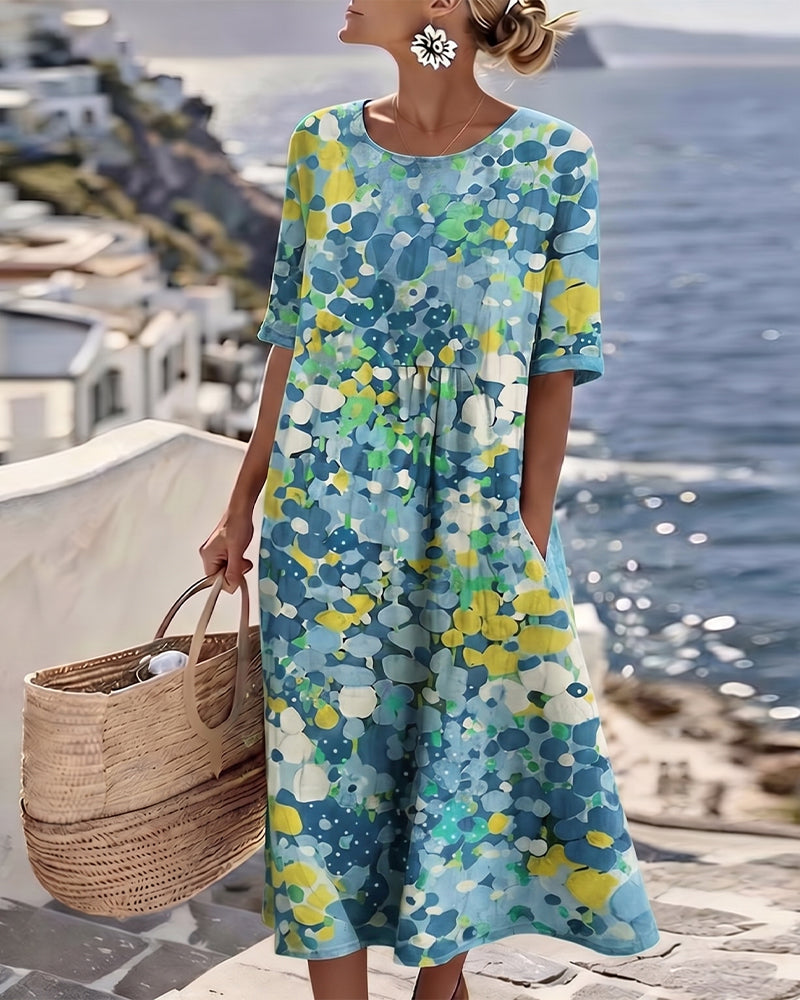 Women's colourful abstract print midi dress with round neckline and 3/4 sleeves