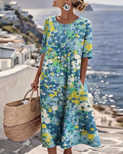 Women's colourful abstract print midi dress with round neckline and 3/4 sleeves