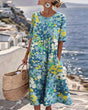 Women's colourful abstract print midi dress with round neckline and 3/4 sleeves