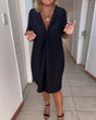 Women's black knee-length dress with V-neck, short sleeves and twist front