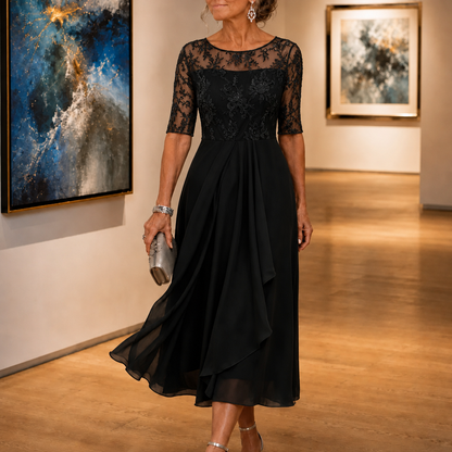 Women's floral lace bodice midi dress with three quarter sleeves and pleated ruffle skirt