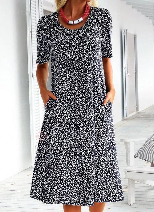 Women's floral midi dress with short sleeves, round neckline and side pockets