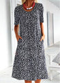 Women's floral midi dress with short sleeves, round neckline and side pockets