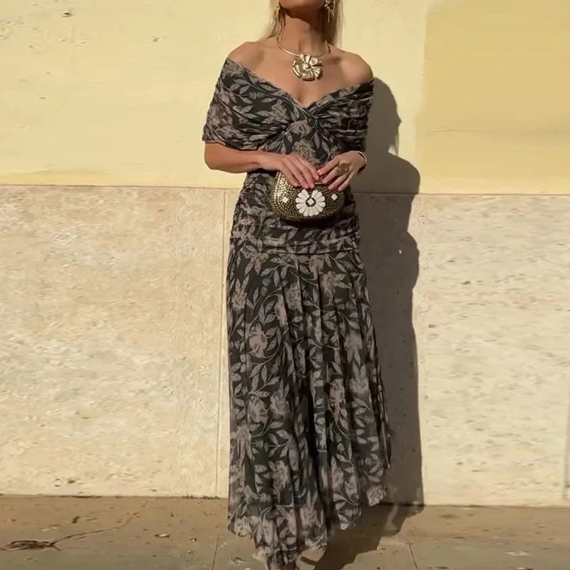 Women's floral off-shoulder maxi dress with ruched waist and flowing skirt