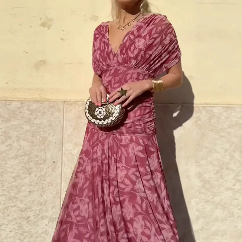 Women's floral off-shoulder maxi dress with ruched waist and flowing skirt