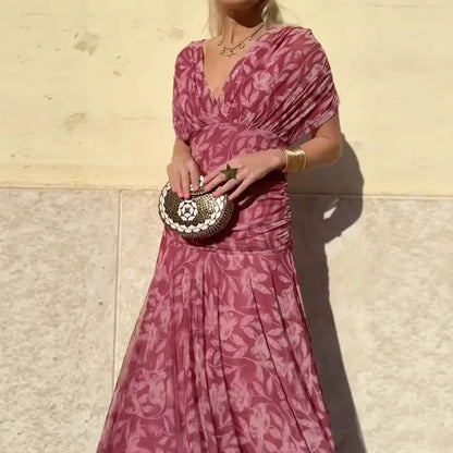 Women's floral off-shoulder maxi dress with ruched waist and flowing skirt