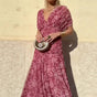 Women's floral off-shoulder maxi dress with ruched waist and flowing skirt