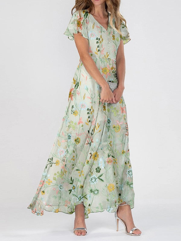 Women's green floral maxi dress with V-neck and flutter sleeves