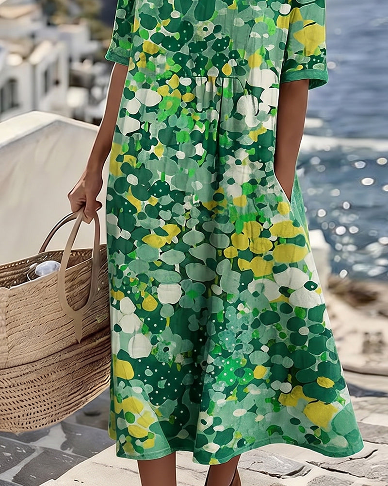 Women's colourful abstract print midi dress with round neckline and 3/4 sleeves