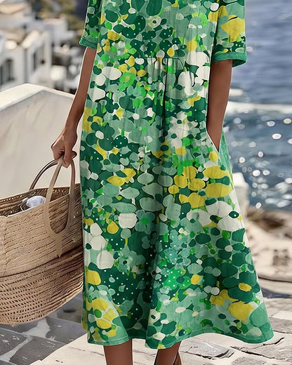 Women's colourful abstract print midi dress with round neckline and 3/4 sleeves