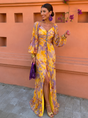 Women's yellow floral maxi dress with off-shoulder neckline and long sleeves