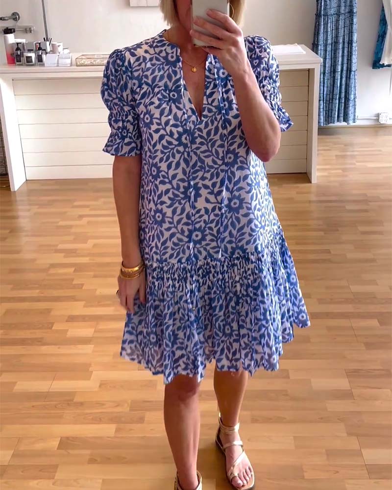 Women's floral mini dress with V-neck, puff sleeves and tiered skirt