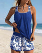 Women's blue pleated tankini top with floral printed shorts