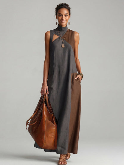Women's sleeveless colour block maxi dress with mock neck, asymmetric hem and side pocket