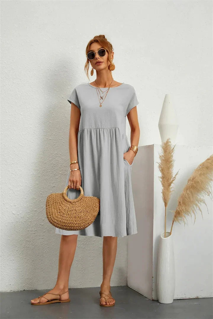 Women's plain gathered midi dress with cap sleeves and side pockets