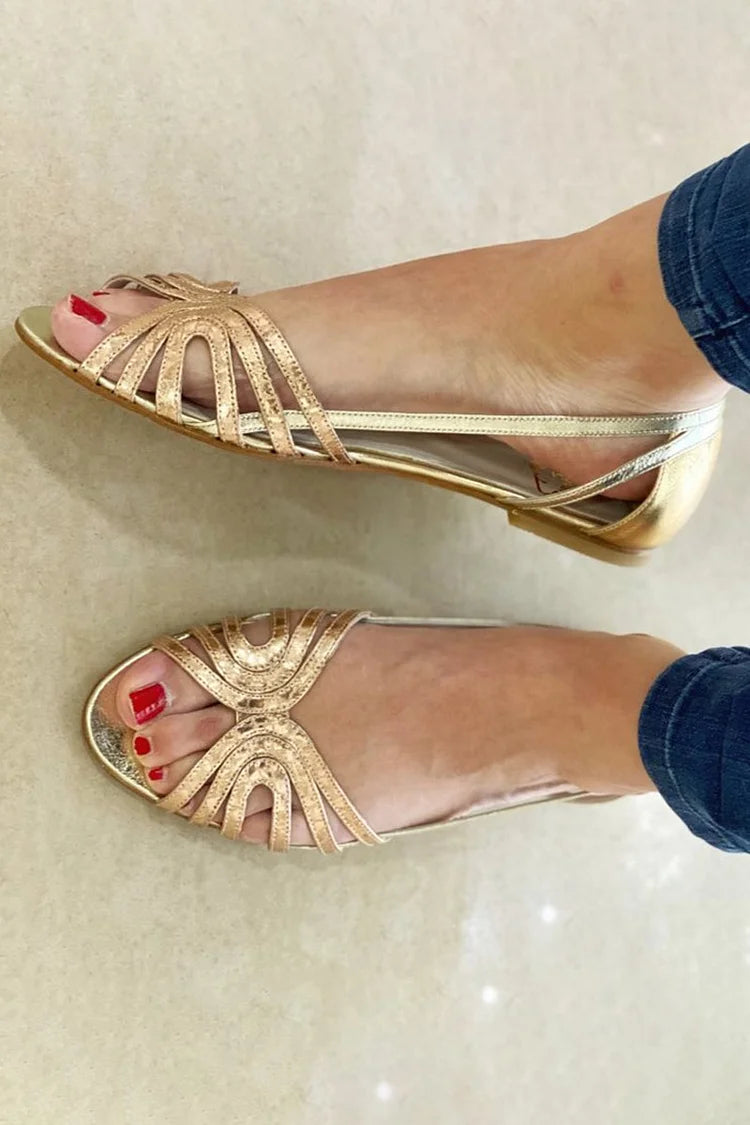 Women's flat sandals with layered straps, open toes and slingback design