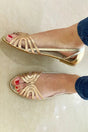 Women's flat sandals with layered straps, open toes and slingback design