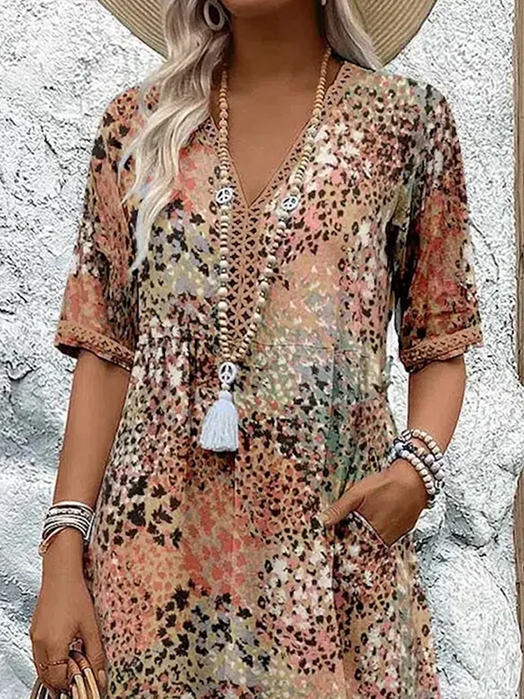Women's animal print V-neck midi dress with short sleeves and side pockets