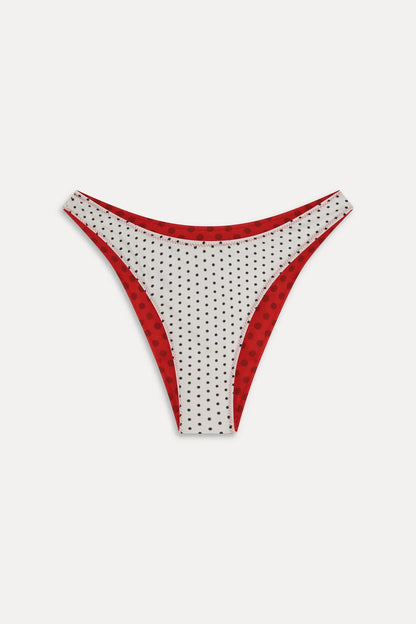 Women's reversible polka dot bikini bottoms with mid-rise brief cut