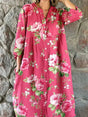 Women's pink floral button-front dress with V-neckline and 3/4 sleeves