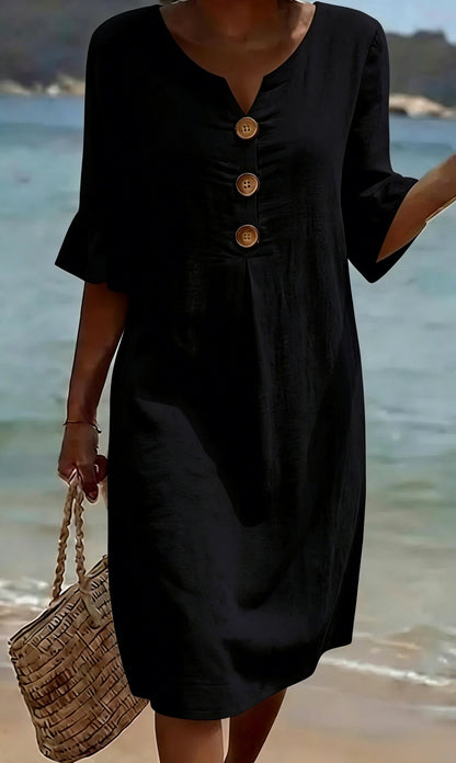 Women's relaxed knee-length button-front dress with split neckline and elbow-length sleeves