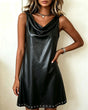 Women's black sleeveless mini dress with draped cowl neckline and grommet hem