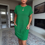 Women's textured short dress with crew neckline, short sleeves and side pockets