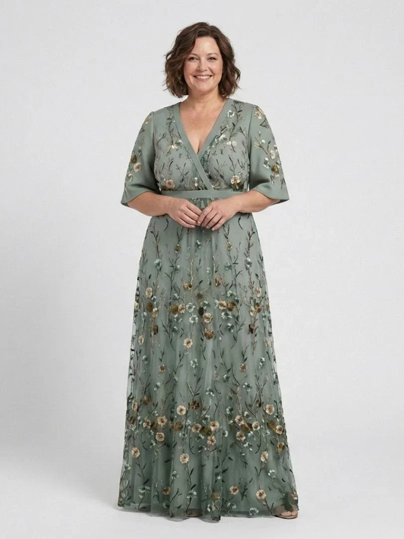Women's green floral wrap maxi dress with V-neck and short sleeves