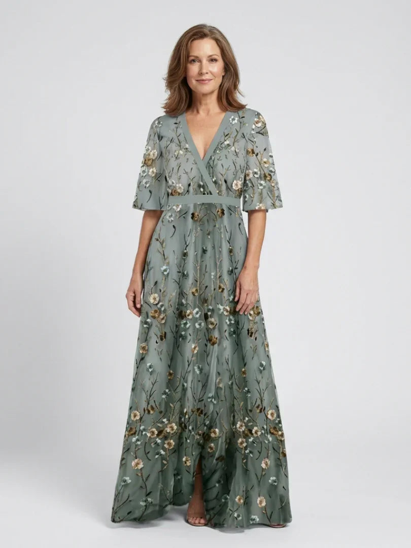 Women's green floral wrap maxi dress with V-neck and short sleeves