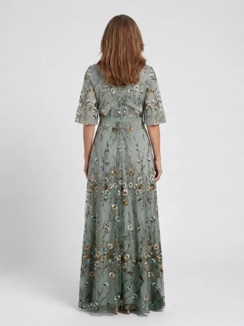 Women's green floral wrap maxi dress with V-neck and short sleeves