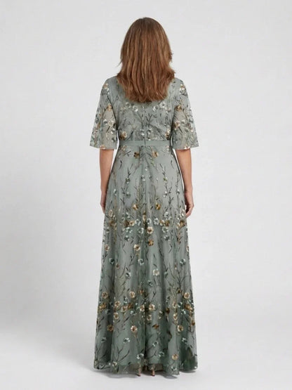 Women's green floral wrap maxi dress with V-neck and short sleeves