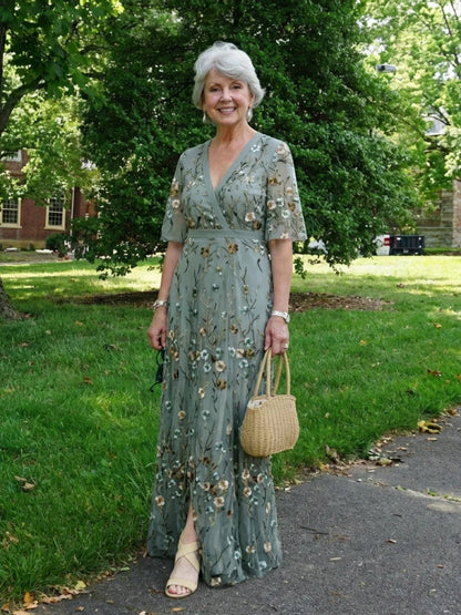 Women's green floral wrap maxi dress with V-neck and short sleeves