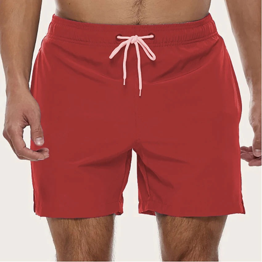 Men's solid swim shorts with elasticated drawstring waist and side pockets