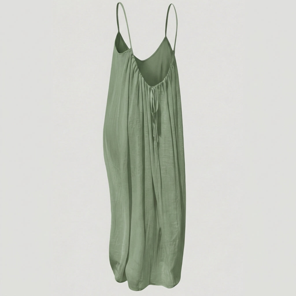 Women's flowing backless maxi dress with V-neckline and spaghetti straps