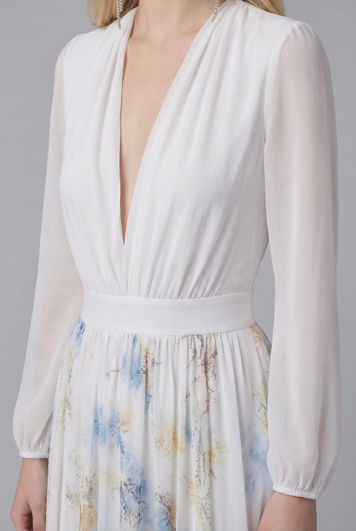 Women's floral maxi dress with draped V-neckline and long sleeves