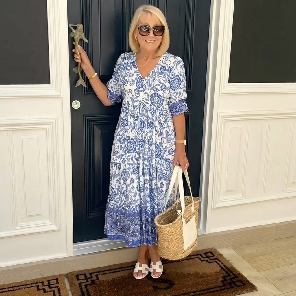 Women's floral V-neck midi dress with three-quarter sleeves