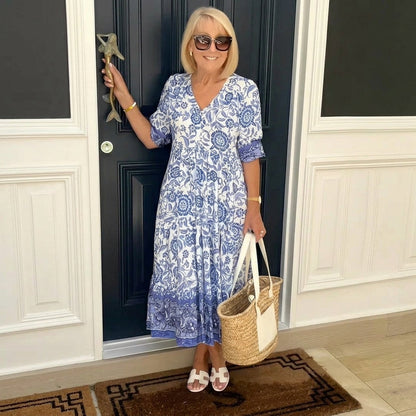 Women's floral V-neck midi dress with three-quarter sleeves