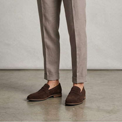 Men's slip-on loafers with penny straps, rounded toes and low heels