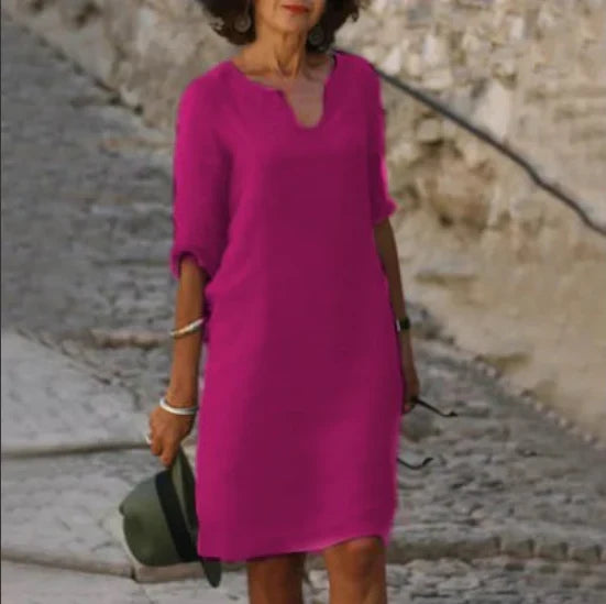 Women's straight mini dress with V-neckline and three-quarter sleeves