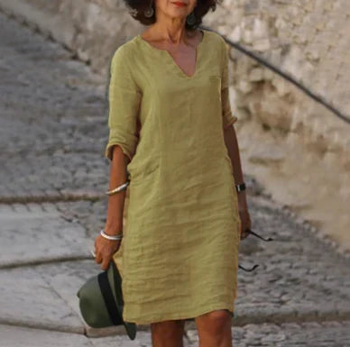 Women's straight mini dress with V-neckline and three-quarter sleeves