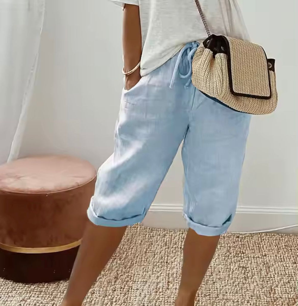 Women's cropped trousers with drawstring waist and rolled cuffs