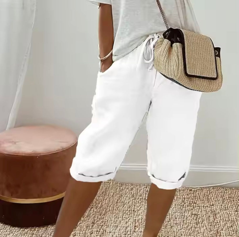 Women's cropped trousers with drawstring waist and rolled cuffs
