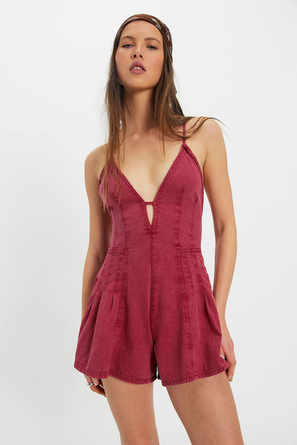 Women's denim romper with spaghetti straps, V-neckline and flared shorts
