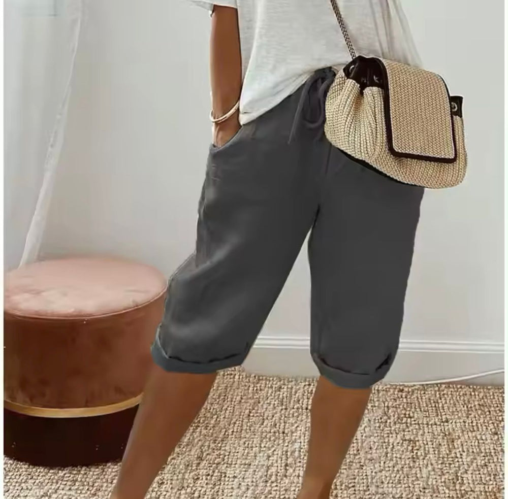 Women's cropped trousers with drawstring waist and rolled cuffs