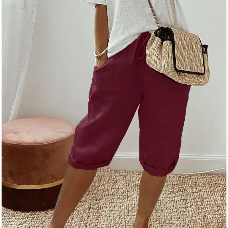 Women's cropped trousers with drawstring waist and rolled cuffs